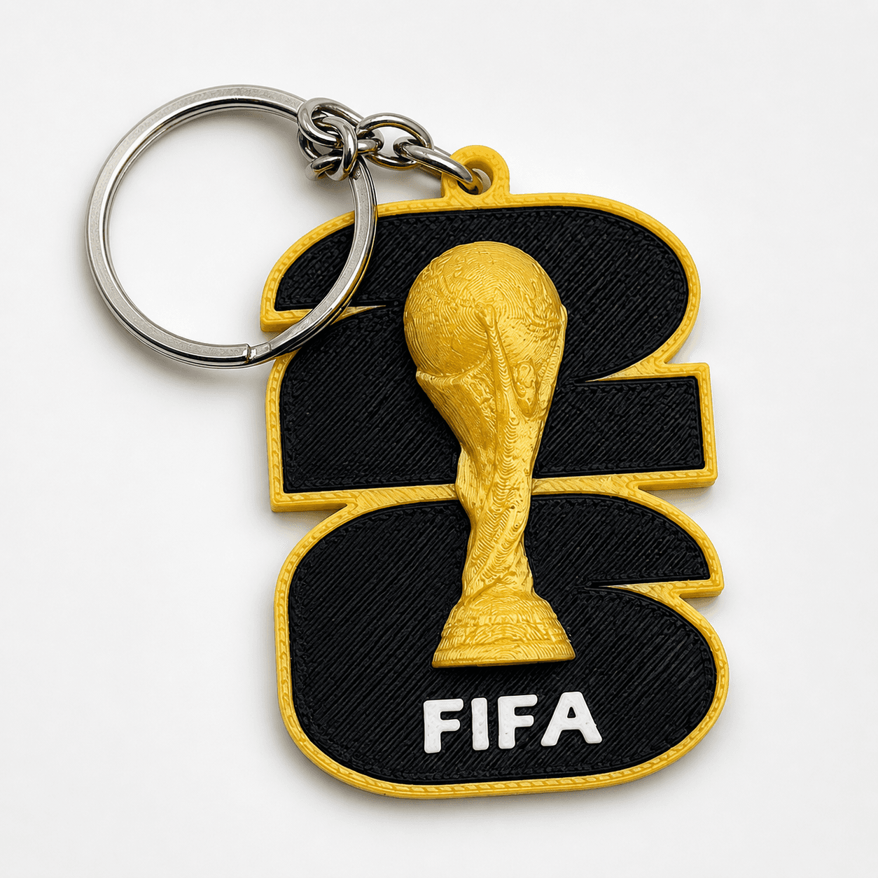 Chaveiro FIFA 26 Troféu Dourado e Preto